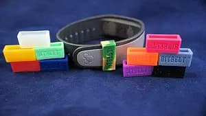 12 pack (one of every color, 3 that glow in the dark!) Protect your Fitbit Charge, Fitbit Charge HR, Garmin Vivofit, or Disney MagicBand We invented the secondary safety clasp. image